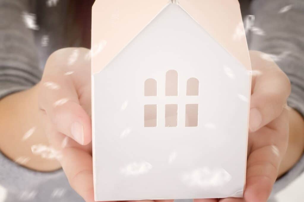 A house cut out from cardboard