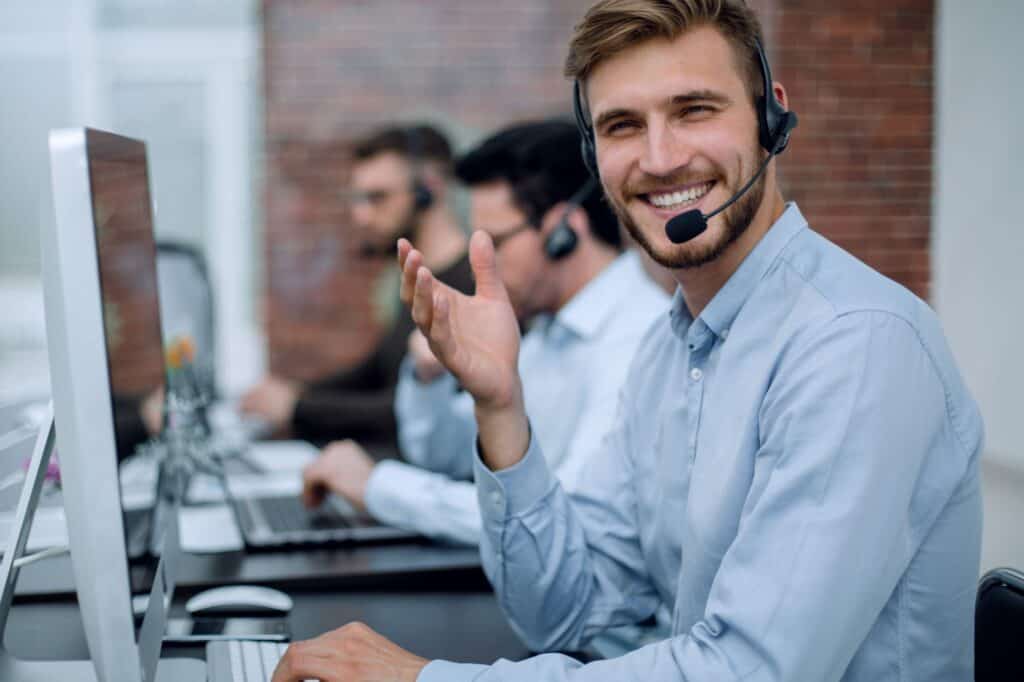 Employees wearing headsets at work