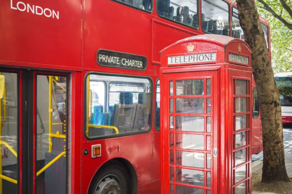 The red bus at full stop