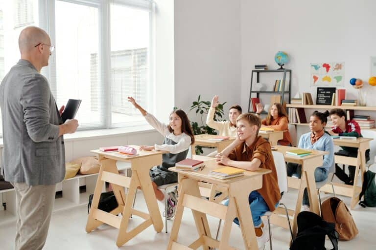 A small classroom with participative students in the concept of top schools North London.